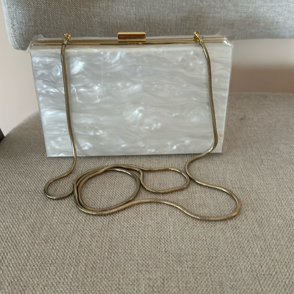 Sophisticated White and Gold Clutch with Minimalist Design